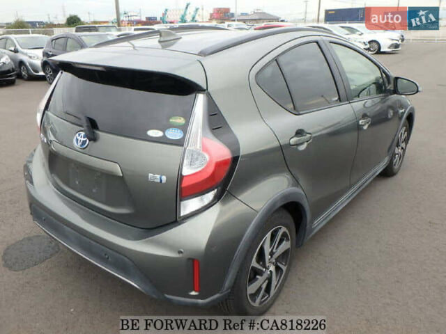 Зелений Тойота Aqua, об'ємом двигуна 1.5 л та пробігом 96 тис. км за 13500 $, фото 7 на Automoto.ua