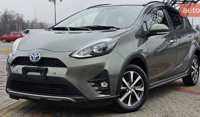 Зелений Тойота Aqua, об'ємом двигуна 1.5 л та пробігом 82 тис. км за 15900 $, фото 7 на Automoto.ua