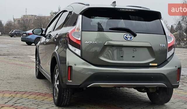 Зелений Тойота Aqua, об'ємом двигуна 1.5 л та пробігом 82 тис. км за 15900 $, фото 19 на Automoto.ua