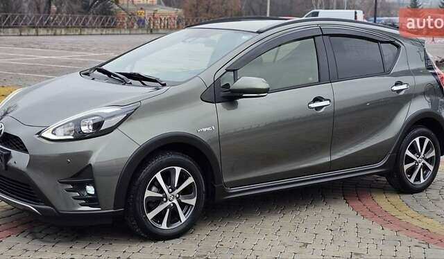 Зелений Тойота Aqua, об'ємом двигуна 1.5 л та пробігом 82 тис. км за 15900 $, фото 33 на Automoto.ua