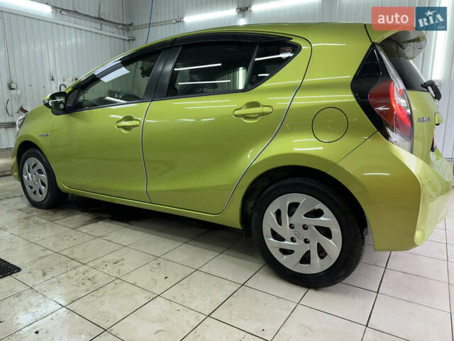 Зелений Тойота Aqua, об'ємом двигуна 1.5 л та пробігом 108 тис. км за 12900 $, фото 3 на Automoto.ua