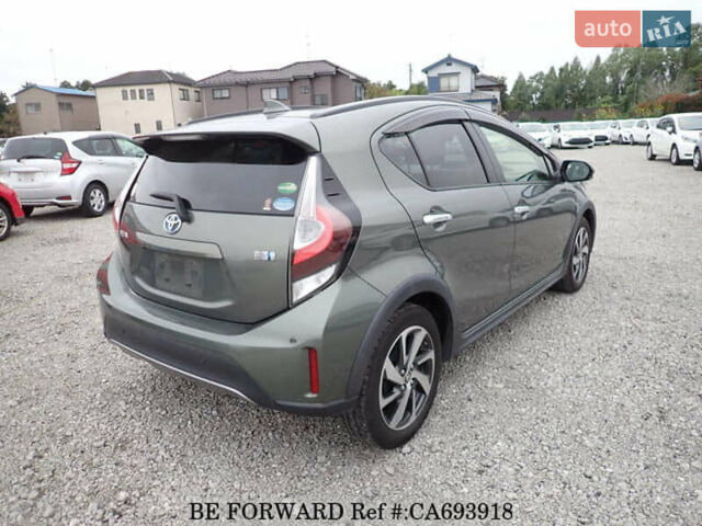 Зеленый Тойота Aqua, объемом двигателя 1.5 л и пробегом 58 тыс. км за 14600 $, фото 4 на Automoto.ua