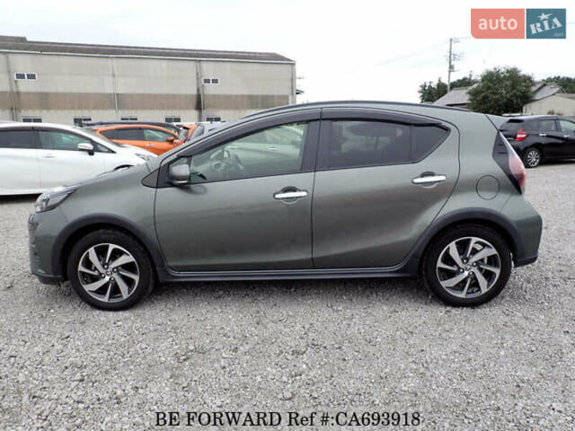 Зеленый Тойота Aqua, объемом двигателя 1.5 л и пробегом 58 тыс. км за 14600 $, фото 1 на Automoto.ua