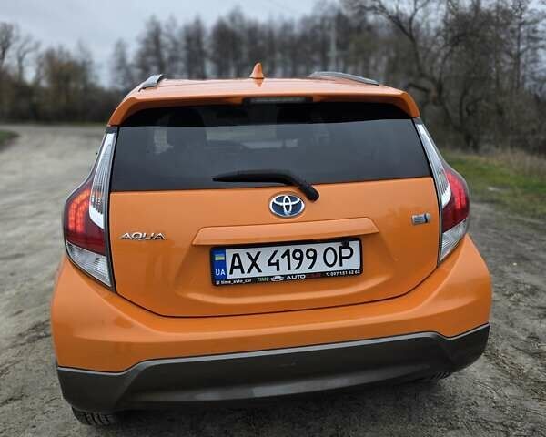 Оранжевый Тойота Aqua, объемом двигателя 1.5 л и пробегом 81 тыс. км за 11500 $, фото 10 на Automoto.ua