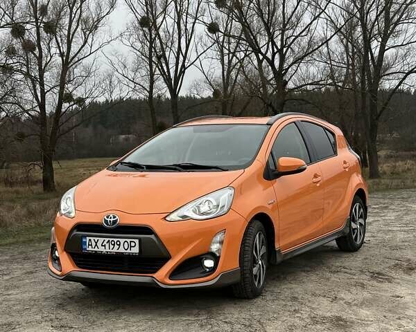 Оранжевый Тойота Aqua, объемом двигателя 1.5 л и пробегом 81 тыс. км за 11500 $, фото 3 на Automoto.ua