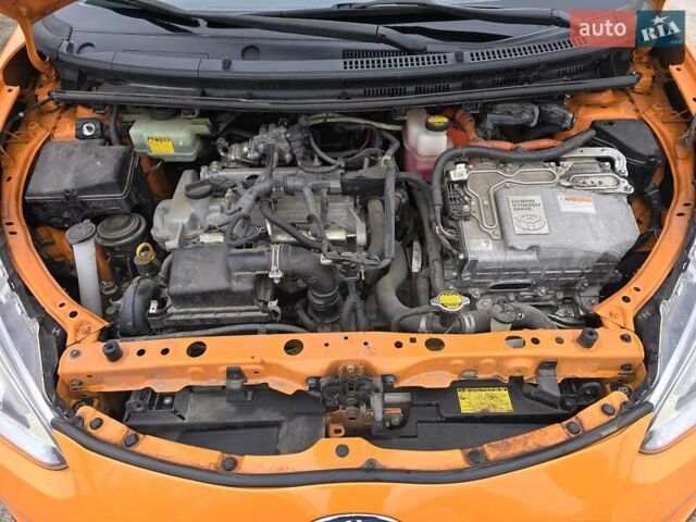 Оранжевый Тойота Aqua, объемом двигателя 1.5 л и пробегом 81 тыс. км за 11500 $, фото 23 на Automoto.ua