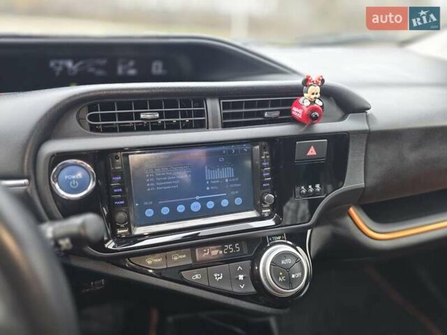 Оранжевый Тойота Aqua, объемом двигателя 1.5 л и пробегом 81 тыс. км за 11500 $, фото 24 на Automoto.ua