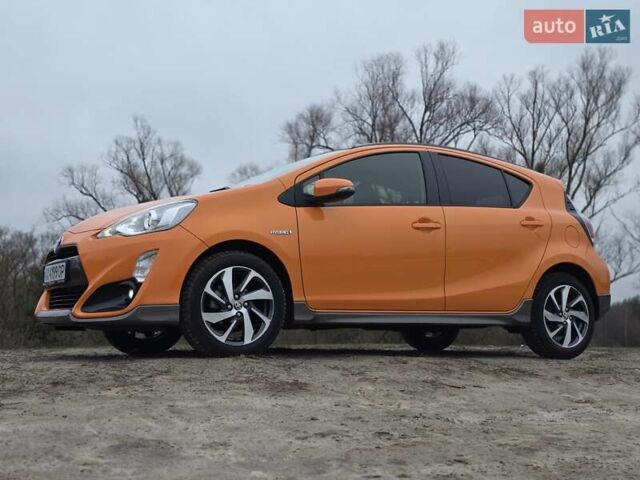 Оранжевый Тойота Aqua, объемом двигателя 1.5 л и пробегом 81 тыс. км за 11500 $, фото 4 на Automoto.ua