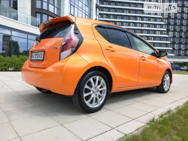 Оранжевый Тойота Aqua, объемом двигателя 1.5 л и пробегом 63 тыс. км за 10900 $, фото 6 на Automoto.ua