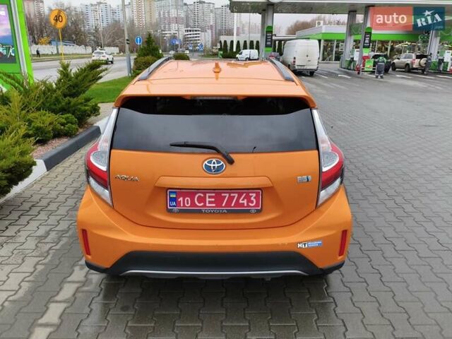 Оранжевый Тойота Aqua, объемом двигателя 1.5 л и пробегом 97 тыс. км за 13400 $, фото 5 на Automoto.ua