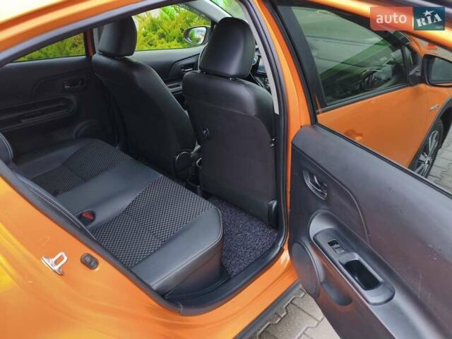 Оранжевый Тойота Aqua, объемом двигателя 1.5 л и пробегом 97 тыс. км за 13400 $, фото 18 на Automoto.ua