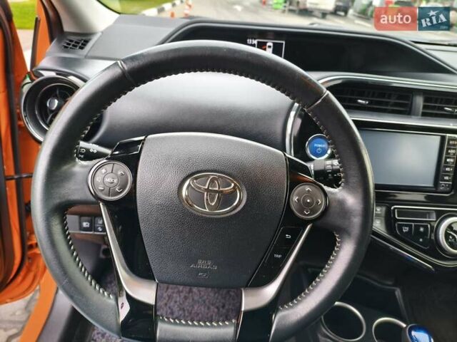 Оранжевый Тойота Aqua, объемом двигателя 1.5 л и пробегом 97 тыс. км за 13400 $, фото 25 на Automoto.ua