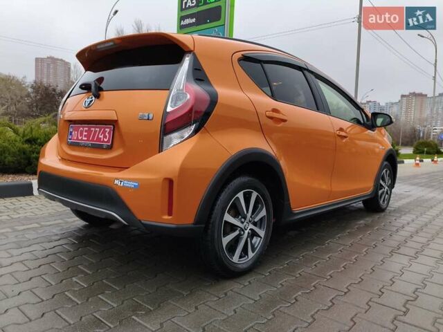 Оранжевый Тойота Aqua, объемом двигателя 1.5 л и пробегом 97 тыс. км за 13400 $, фото 4 на Automoto.ua