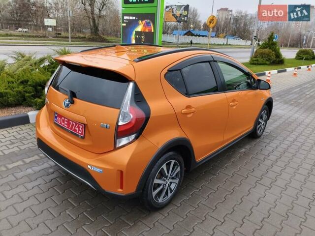 Оранжевый Тойота Aqua, объемом двигателя 1.5 л и пробегом 97 тыс. км за 13400 $, фото 3 на Automoto.ua