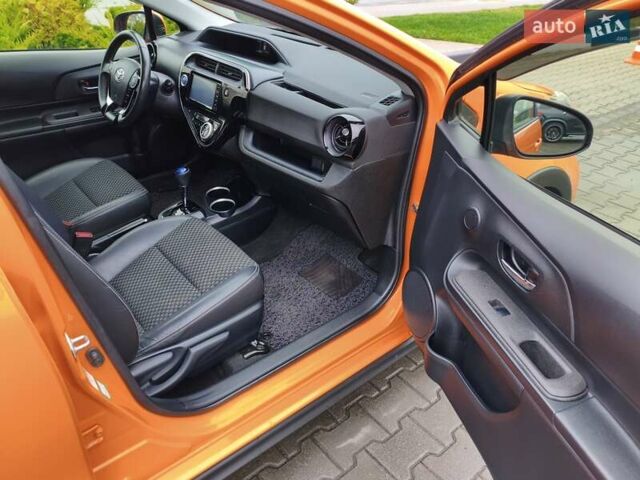 Оранжевый Тойота Aqua, объемом двигателя 1.5 л и пробегом 97 тыс. км за 13400 $, фото 19 на Automoto.ua