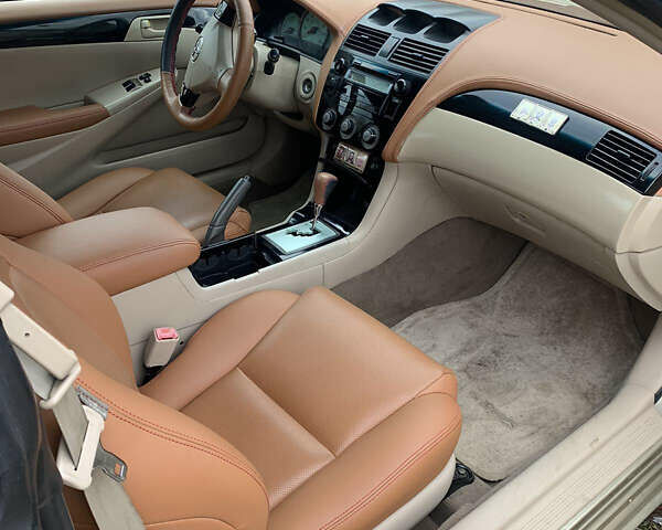 Бежевый Тойота Camry Solara, объемом двигателя 2.4 л и пробегом 179 тыс. км за 5500 $, фото 2 на Automoto.ua