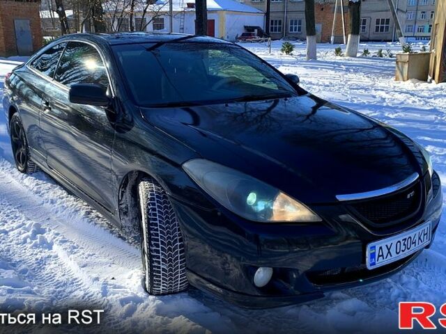 Черный Тойота Camry Solara, объемом двигателя 2.4 л и пробегом 320 тыс. км за 6000 $, фото 2 на Automoto.ua