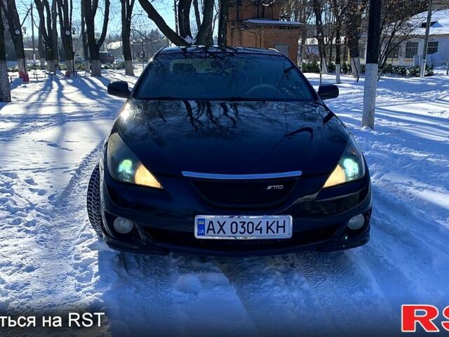 Черный Тойота Camry Solara, объемом двигателя 2.4 л и пробегом 320 тыс. км за 6000 $, фото 1 на Automoto.ua