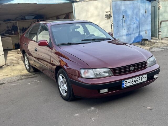 Красный Тойота Carina E, объемом двигателя 1.6 л и пробегом 259 тыс. км за 2800 $, фото 3 на Automoto.ua