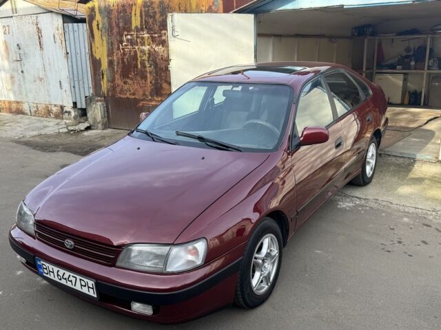 Красный Тойота Carina E, объемом двигателя 1.6 л и пробегом 259 тыс. км за 2800 $, фото 4 на Automoto.ua