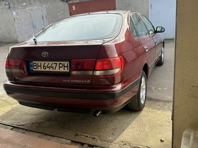 Красный Тойота Carina E, объемом двигателя 1.6 л и пробегом 259 тыс. км за 2800 $, фото 5 на Automoto.ua