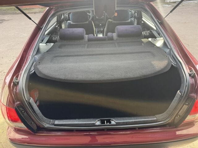 Красный Тойота Carina E, объемом двигателя 1.6 л и пробегом 259 тыс. км за 2800 $, фото 10 на Automoto.ua