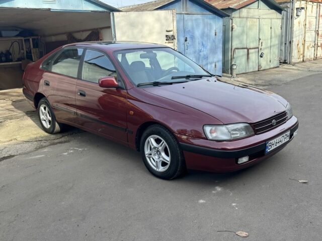 Красный Тойота Carina E, объемом двигателя 1.6 л и пробегом 259 тыс. км за 2800 $, фото 6 на Automoto.ua