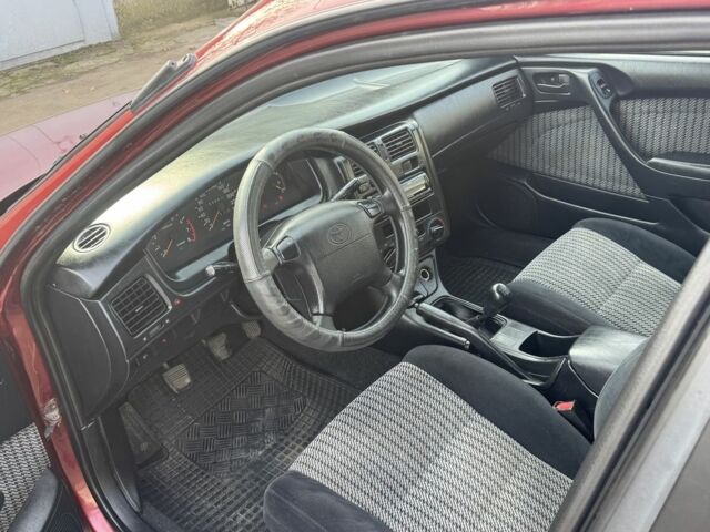 Красный Тойота Carina E, объемом двигателя 1.6 л и пробегом 259 тыс. км за 2800 $, фото 9 на Automoto.ua