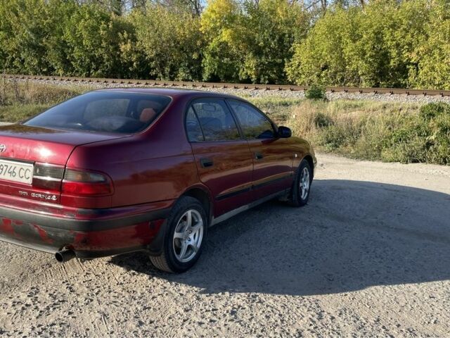 Тойота Carina E 1993 в Павлограде на Automoto.ua Красный Тойота Carina E, объемом двигателя 2 л и пробегом 380 тыс. км за 2500 $, фото 20 на Automoto.ua
