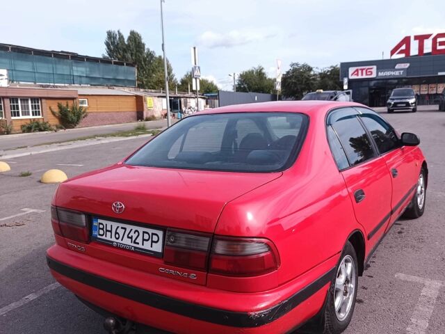 Червоний Тойота Carina E, об'ємом двигуна 2 л та пробігом 290 тис. км за 2300 $, фото 3 на Automoto.ua
