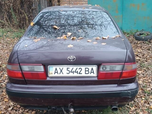 Червоний Тойота Carina E, об'ємом двигуна 1.6 л та пробігом 350 тис. км за 952 $, фото 7 на Automoto.ua