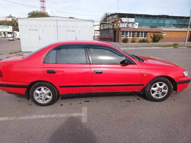 Червоний Тойота Carina E, об'ємом двигуна 2 л та пробігом 290 тис. км за 2300 $, фото 4 на Automoto.ua
