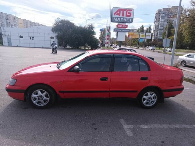 Червоний Тойота Carina E, об'ємом двигуна 2 л та пробігом 290 тис. км за 2300 $, фото 5 на Automoto.ua