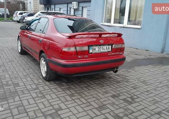 Червоний Тойота Carina E, об'ємом двигуна 1.6 л та пробігом 300 тис. км за 2670 $, фото 15 на Automoto.ua