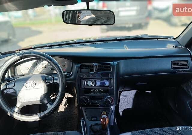 Червоний Тойота Carina E, об'ємом двигуна 2 л та пробігом 260 тис. км за 4500 $, фото 6 на Automoto.ua