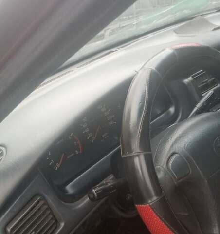 Красный Тойота Carina E, объемом двигателя 1.6 л и пробегом 450 тыс. км за 1150 $, фото 4 на Automoto.ua