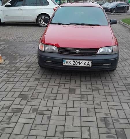 Червоний Тойота Carina E, об'ємом двигуна 1.6 л та пробігом 300 тис. км за 2670 $, фото 5 на Automoto.ua