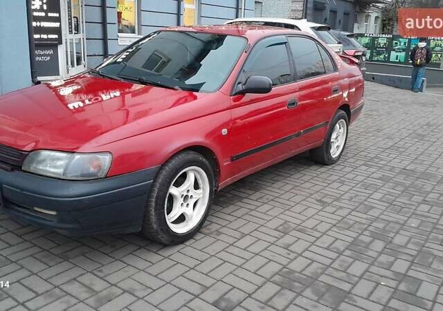 Червоний Тойота Carina E, об'ємом двигуна 1.6 л та пробігом 300 тис. км за 2670 $, фото 2 на Automoto.ua