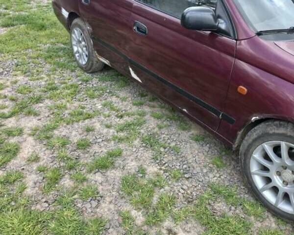 Красный Тойота Carina E, объемом двигателя 1.6 л и пробегом 450 тыс. км за 1150 $, фото 8 на Automoto.ua