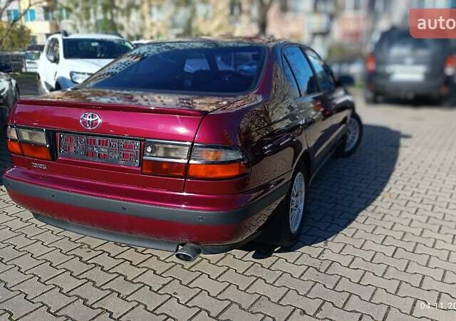 Червоний Тойота Carina E, об'ємом двигуна 2 л та пробігом 260 тис. км за 4500 $, фото 10 на Automoto.ua