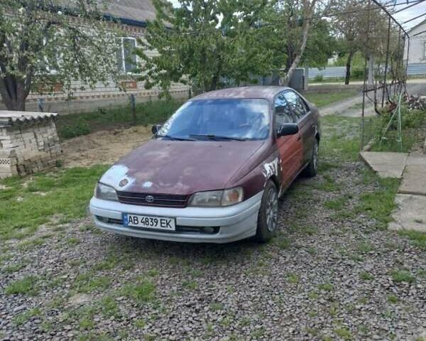 Красный Тойота Carina E, объемом двигателя 1.6 л и пробегом 450 тыс. км за 1150 $, фото 9 на Automoto.ua