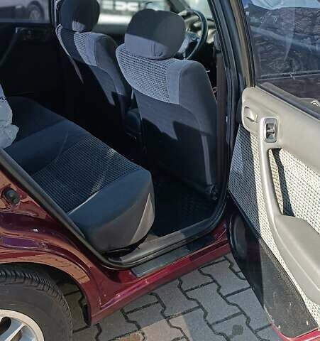 Червоний Тойота Carina E, об'ємом двигуна 2 л та пробігом 260 тис. км за 4500 $, фото 3 на Automoto.ua