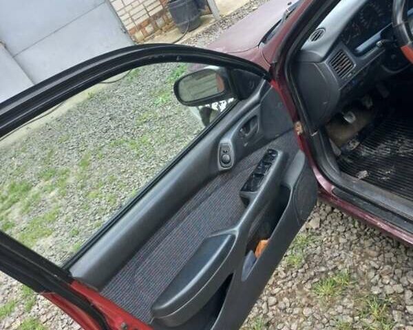 Красный Тойота Carina E, объемом двигателя 1.6 л и пробегом 450 тыс. км за 1150 $, фото 7 на Automoto.ua