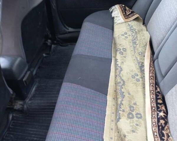 Красный Тойота Carina E, объемом двигателя 1.6 л и пробегом 450 тыс. км за 1150 $, фото 11 на Automoto.ua