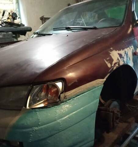 Красный Тойота Carina E, объемом двигателя 1.6 л и пробегом 450 тыс. км за 1150 $, фото 5 на Automoto.ua