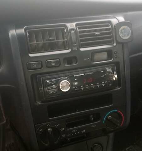 Красный Тойота Carina E, объемом двигателя 1.6 л и пробегом 450 тыс. км за 1150 $, фото 2 на Automoto.ua