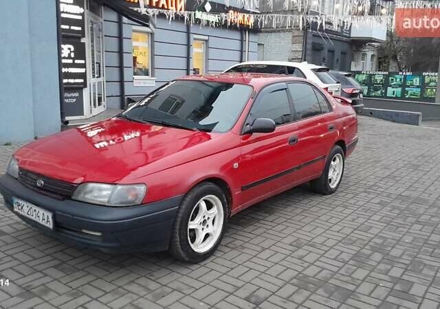 Червоний Тойота Carina E, об'ємом двигуна 1.6 л та пробігом 300 тис. км за 2670 $, фото 14 на Automoto.ua