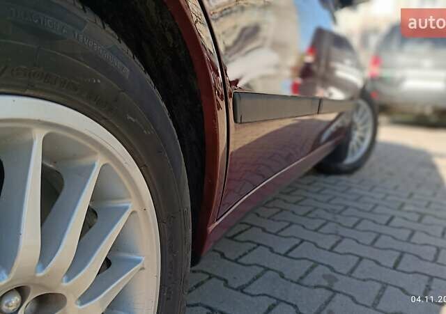 Червоний Тойота Carina E, об'ємом двигуна 2 л та пробігом 260 тис. км за 4500 $, фото 7 на Automoto.ua