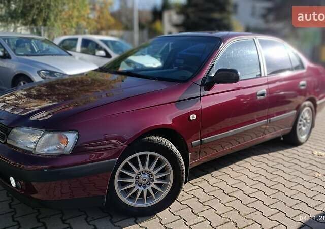 Червоний Тойота Carina E, об'ємом двигуна 2 л та пробігом 260 тис. км за 4500 $, фото 5 на Automoto.ua