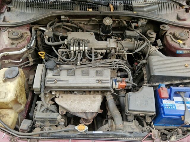 Червоний Тойота Carina E, об'ємом двигуна 1.6 л та пробігом 220 тис. км за 1500 $, фото 10 на Automoto.ua